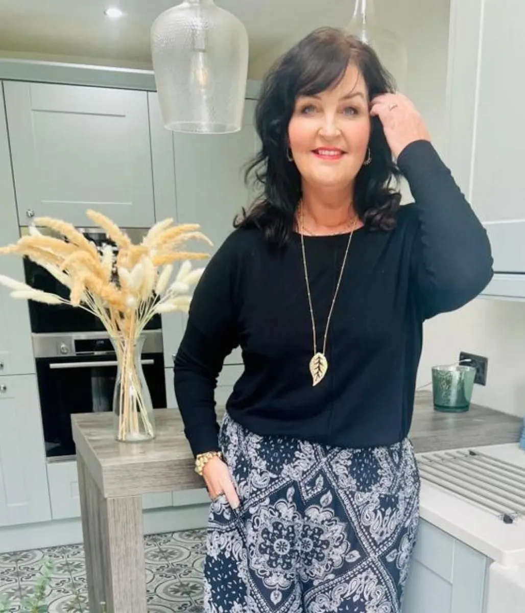 Black Curve Tunic Jumper