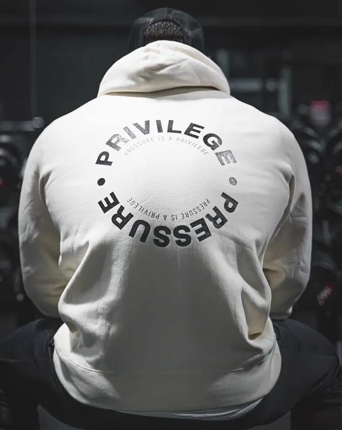 GYM BUDDY PRESSURE IS A PRIVILEGE UNISEX PLUSH HOODIE